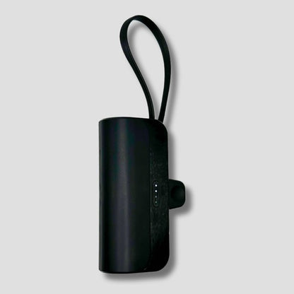 BoostBuddy portable charger in black, emphasizing its minimalist design and convenient loop handle.